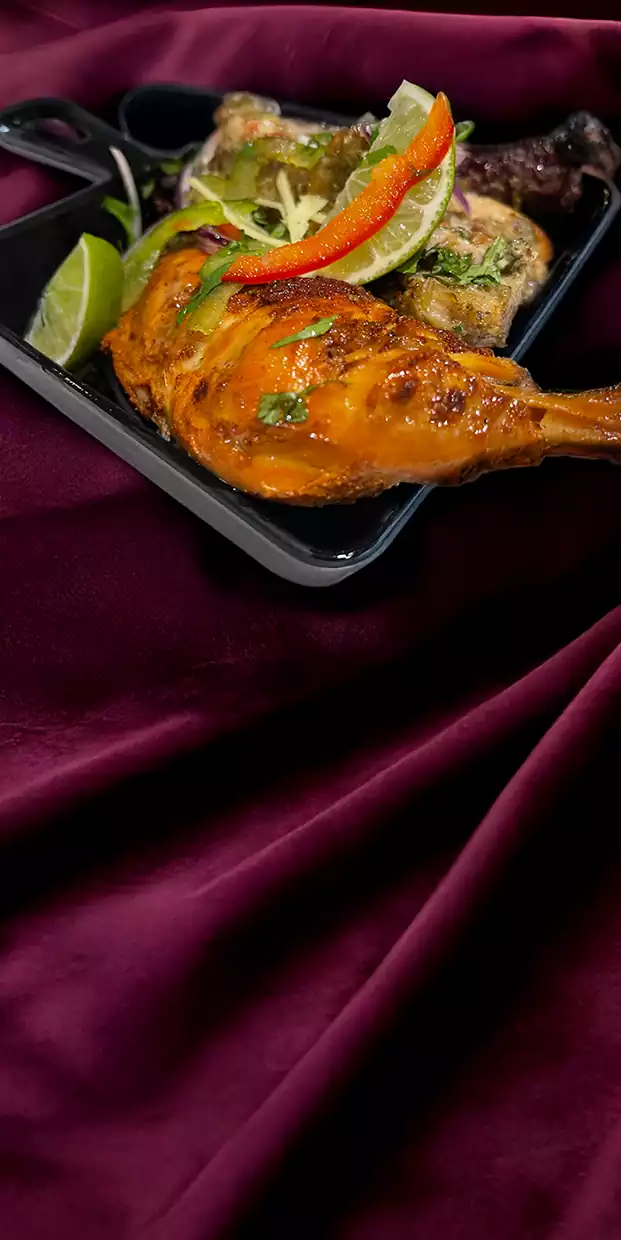 Retten kylling tandoori fra restauranten Punjab Tandoori